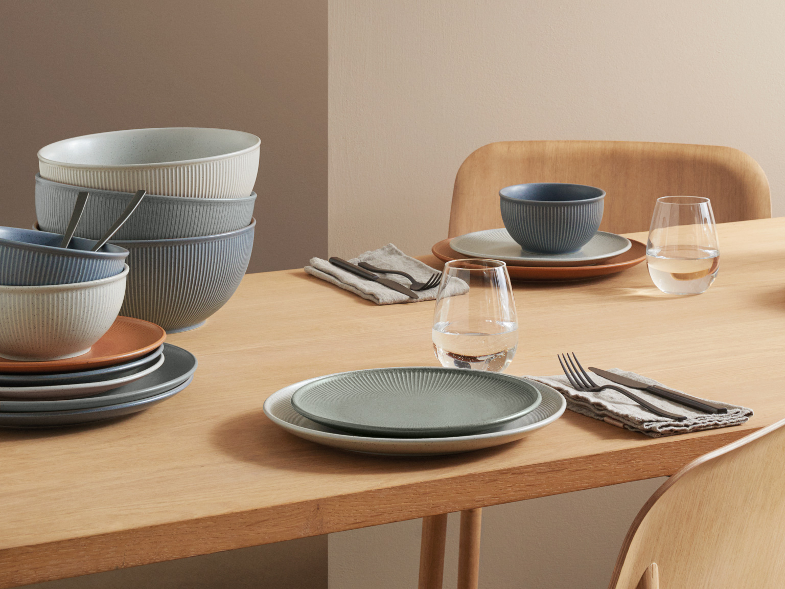 Thomas Clay set table with grey plates & bowls in various colours
